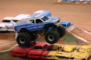 The Air Force sponsored monster truck Afterburner, driven by Damon Bradshaw, soars over an obstacle 