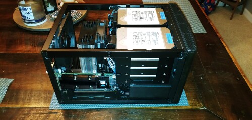 The finished build.  It's absolutely packed in there, but everything clears, and everything works well.  Amazingly, runs nice and cool also.  Drives stay around 29-31C.