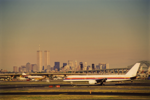 JFK and the NYC Cityscape by Manhattan4